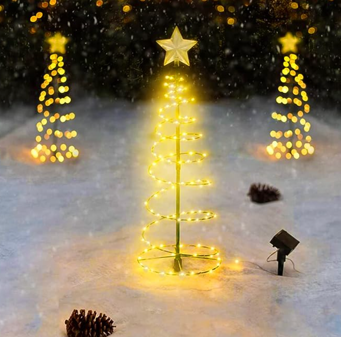 Estaca Solas En Forma De Árbol De Navidad En Luz Cálida